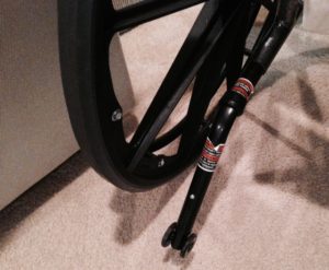 wheelchair tip bar